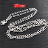 Silver flattened chain connector for jewelry making displayed on a dark surface.