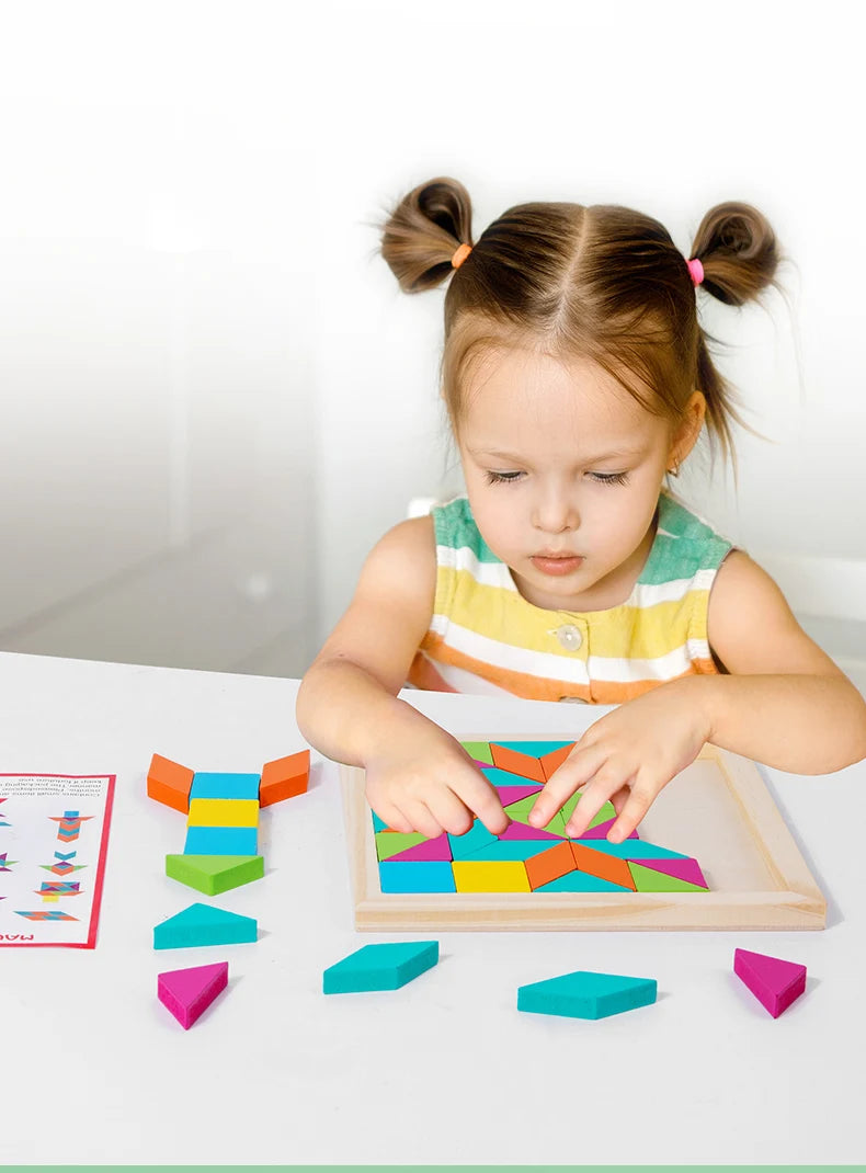 A young girl is assembling a wooden geometric shape puzzle on a white table.