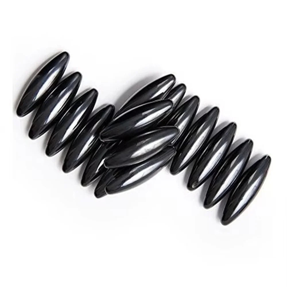 A cluster of black, elongated magnetic olive snake egg fidget toys.