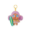 A vinyl figure of a purple-haired character with blue eyes and a yellow outfit, hanging from a gold-colored loop.