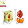 A box of 94 pieces of florist building blocks in orange and green colors, showing the size of the set.