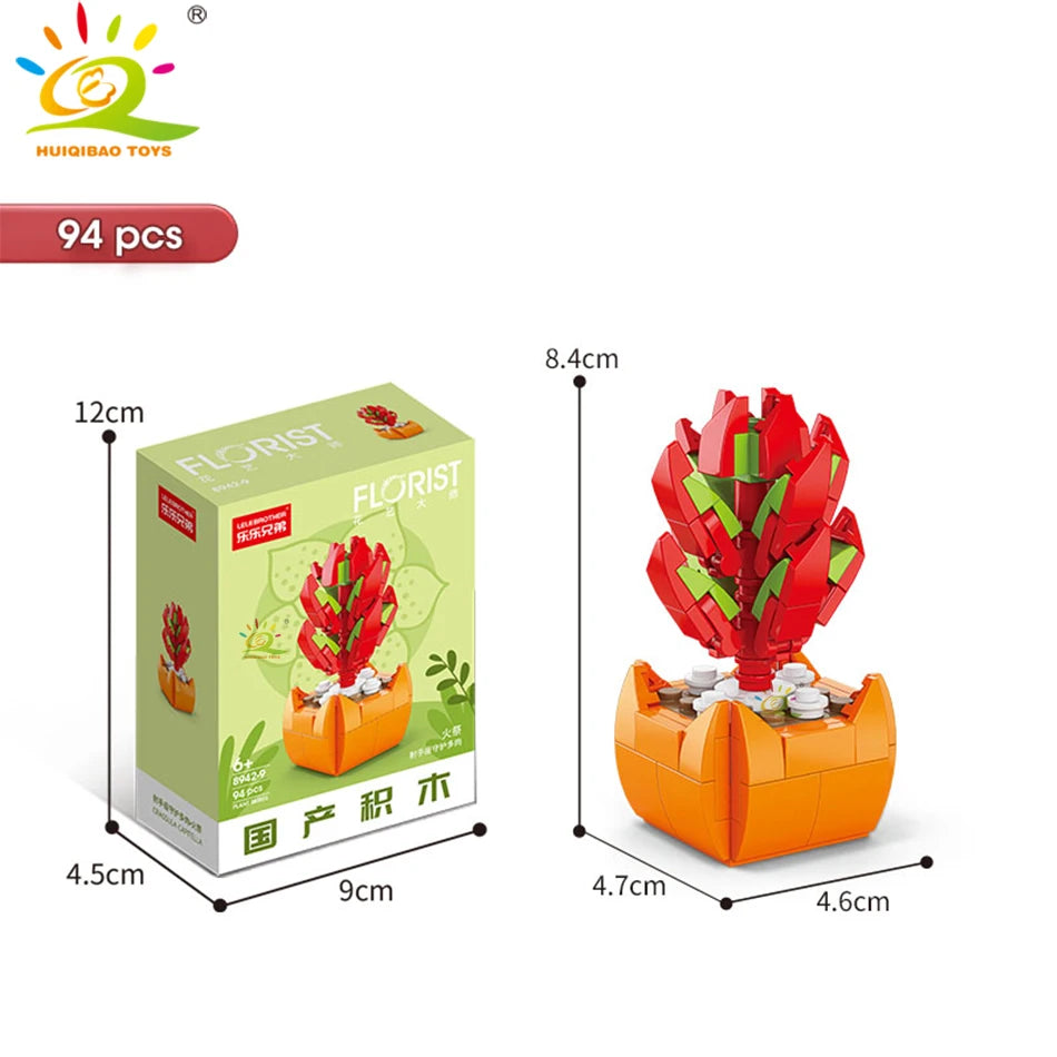 A box of 94 pieces of florist building blocks in orange and green colors, showing the size of the set.