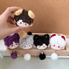 A collection of plush pendant keychains featuring cute, chibi-style animal faces in various colors like brown, purple, gray, 