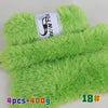 A bright lime green faux fur yarn product showing a roll of yarn and a swatch of the fluffy material.