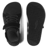 A pair of black minimalist barefoot sneakers shown from the top and bottom views.