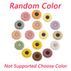 A collection of colorful daisy and sunflower silicone beads in various shades including pink, yellow, purple, and beige.