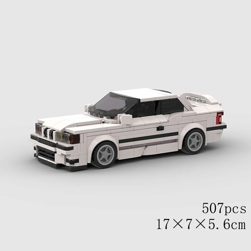 A white classic rally car model built from LEGO bricks, shown in a side view.