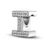 A sterling silver alphabet charm featuring a letter T encrusted with cubic zirconia stones.