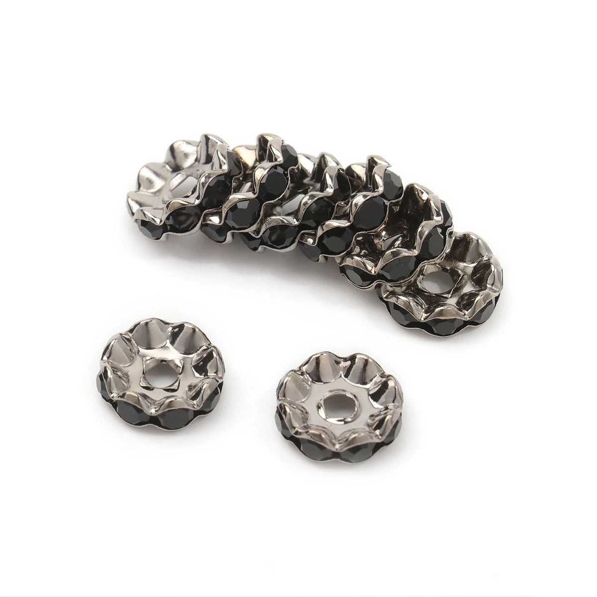 A cluster of 12mm crystal rhinestone spacer beads in a silver-toned metal finish.