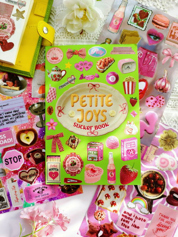 A colorful sticker book for scrapbooking featuring various decorative stickers and craft supplies.