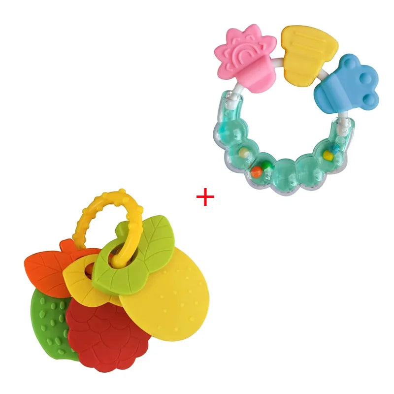 A silicone teether toy featuring various colorful shapes including a pink flower, yellow piece, blue shapes, and an orange fr