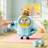 A light blue vinyl plush keychain featuring a character with large eyes and a small bear head.