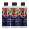 Three bottles of puzzle glue with colorful hexagonal patterns and black caps