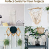 Macrame rope decor featuring various natural cotton fibers and tassels used for crafts and home decor projects.