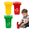 A set of three mini recycling truck toys in yellow, red, and green for children.