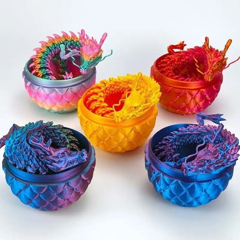 Collection de neuf modèles de dragons aux couleurs vives et détails complexes, imprimés en 3D.