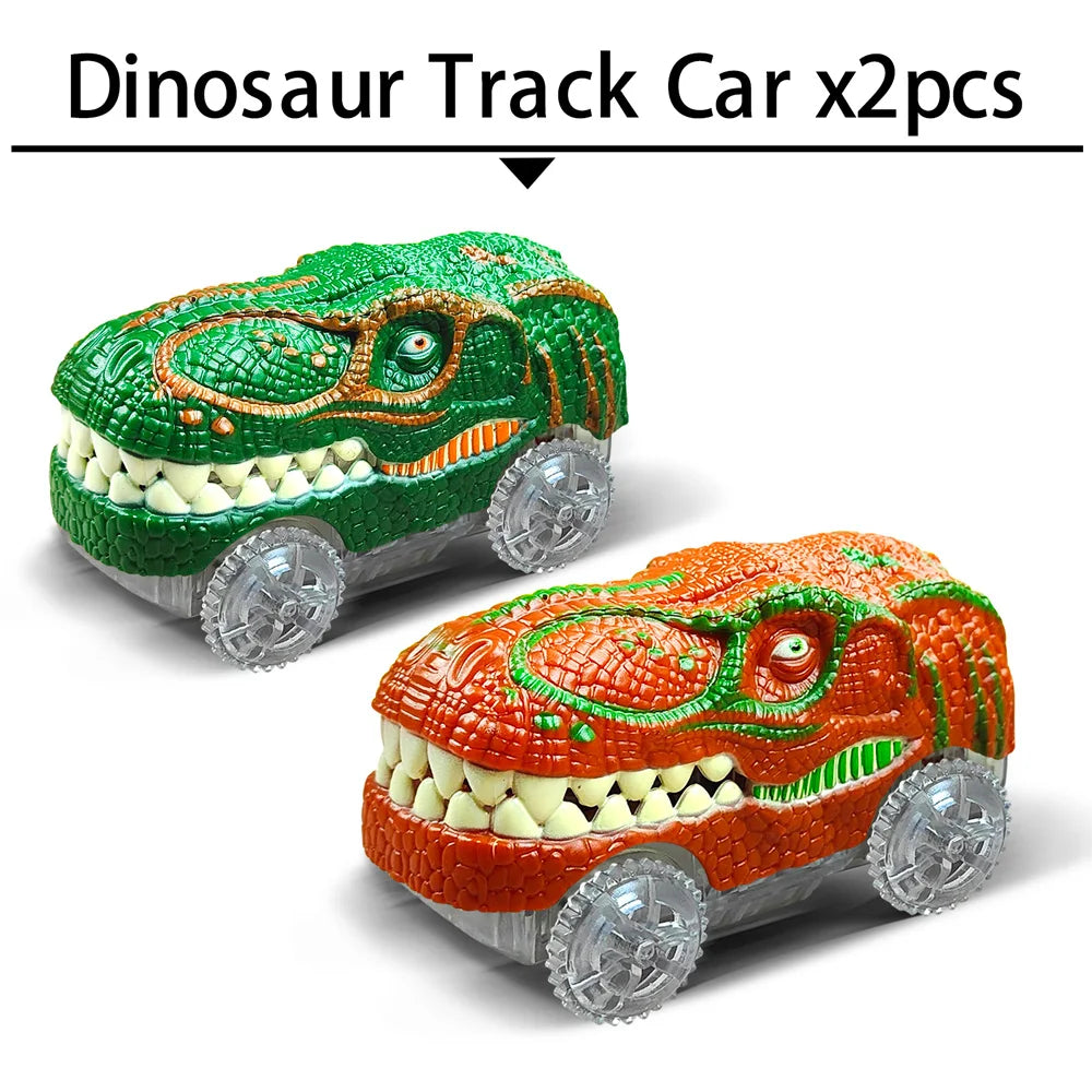 Two dinosaur track cars, one green and one orange, are shown side by side.
