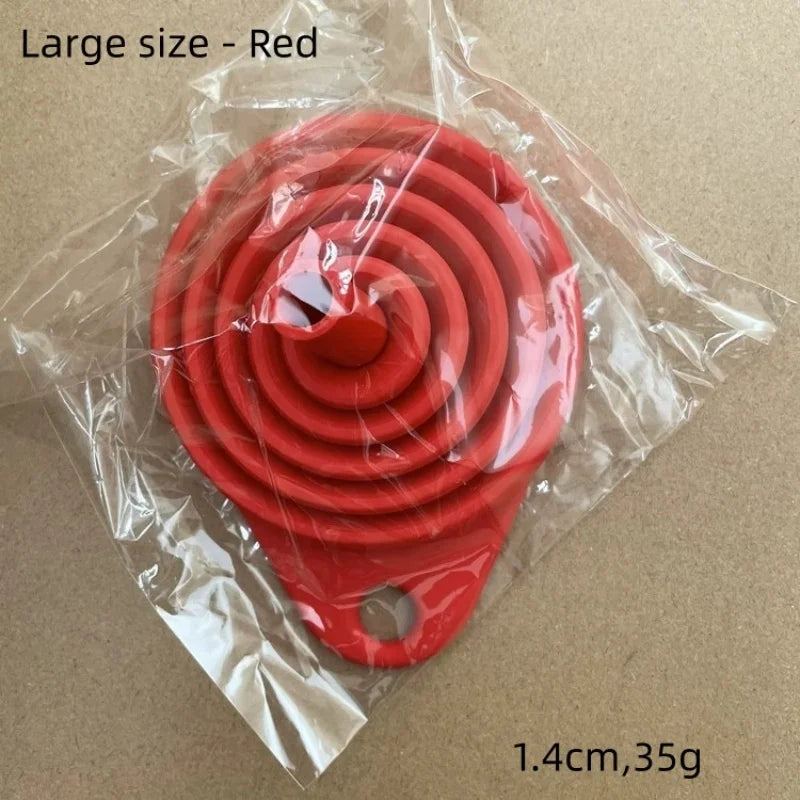 Large size red silicone funnel set packaged in clear plastic.