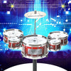 A child-safe plastic jazz drum set with multiple drums mounted on a stand for music learning