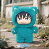 A plush toy resembling a blue cat character from Jujutsu Kaisen is shown outdoors.
