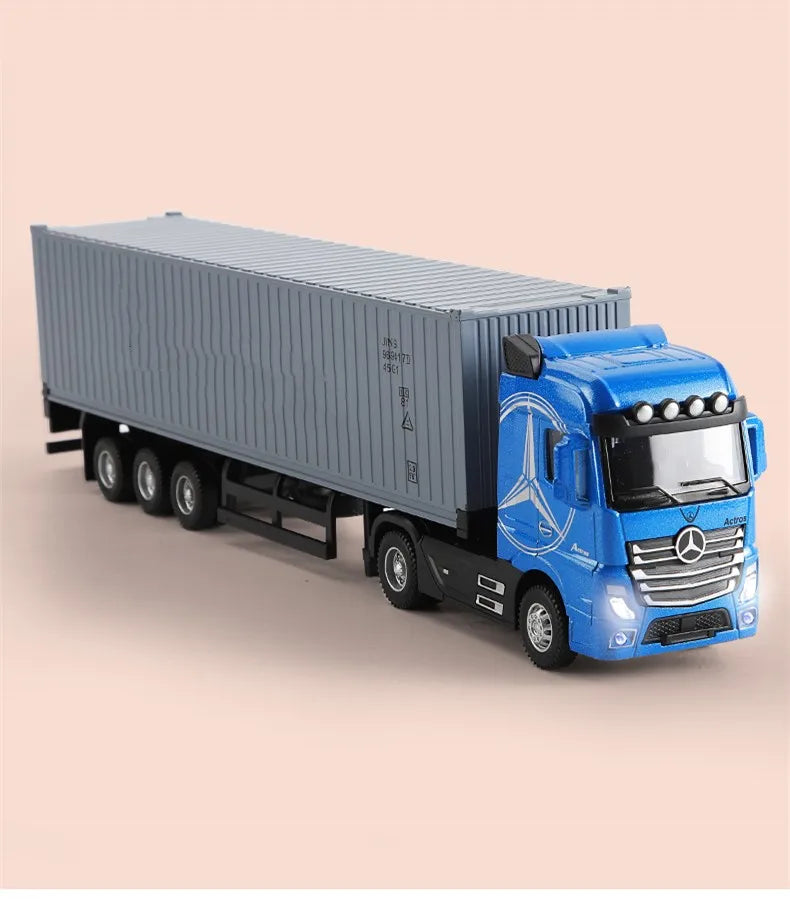 A blue Mercedes-Benz truck pulling a gray container trailer, featuring pull-back action and sound/light effects.