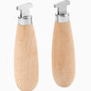 A professional bezel setting pusher tool with a silver handle and wooden grip.