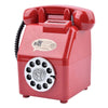 A red vintage rotary telephone piggy bank with a slot for coins and bills.
