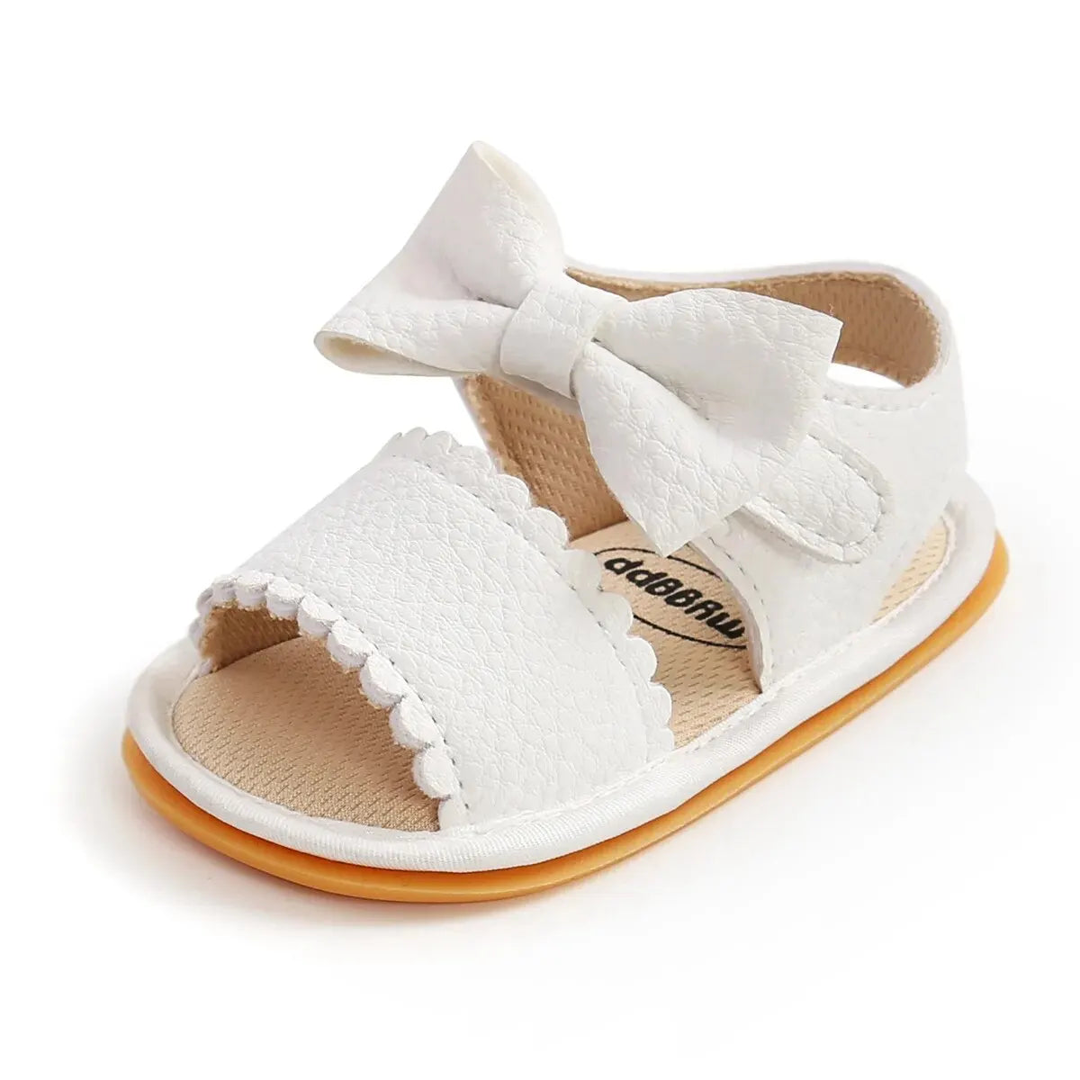 White baby summer sandals with a bowknot and soft anti-slip sole
