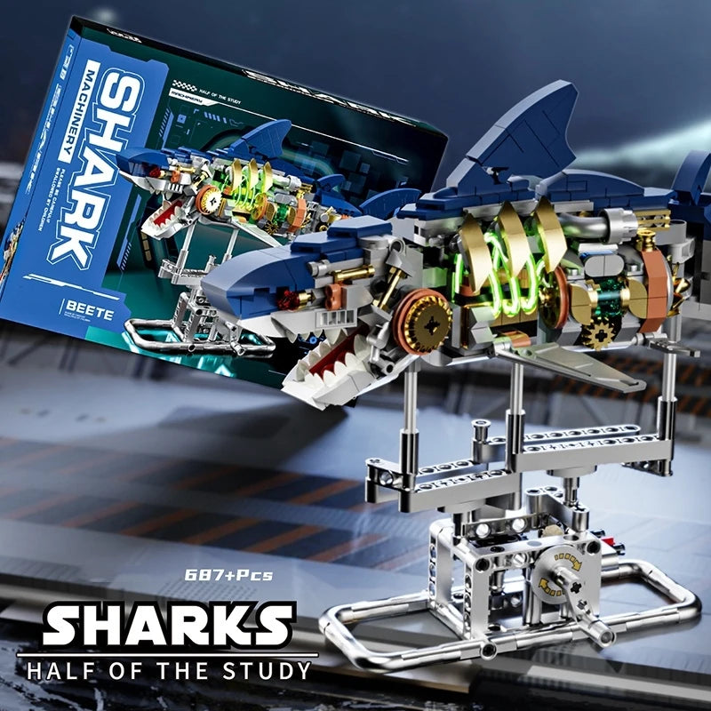 A detailed model of a shark mech built from plastic parts displayed on a stand.
