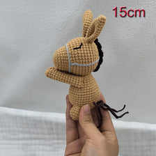 Handmade amigurumi plush toy set featuring sleeping dolls of a fox, cow, and lamb.