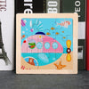 A wooden tangram puzzle featuring colorful animal and traffic designs on a light wood background.
