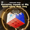 A white and red magnetic speed cube is shown in a top-down view against a dark background.
