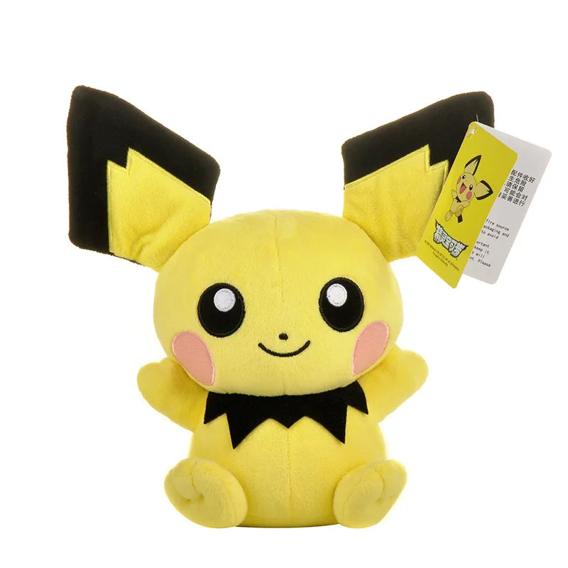 A yellow and black plush doll of Pikachu sitting down with large eyes and ears, accompanied by a product card.