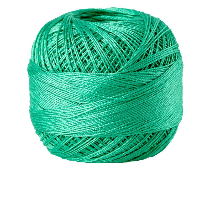 A ball of bright green 100% cotton crochet thread used for tatting and embroidery.