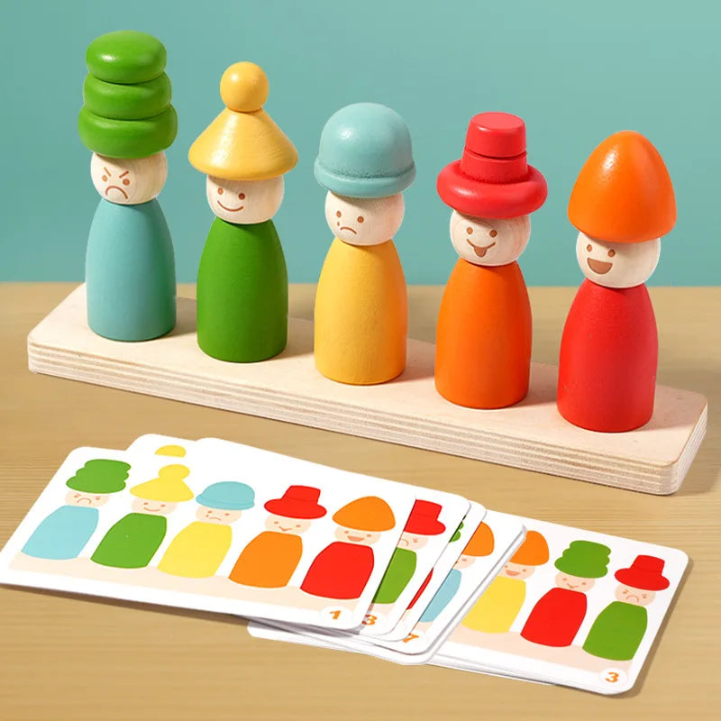 A set of wooden stacking toys depicting various emotions with different colored heads and bodies.