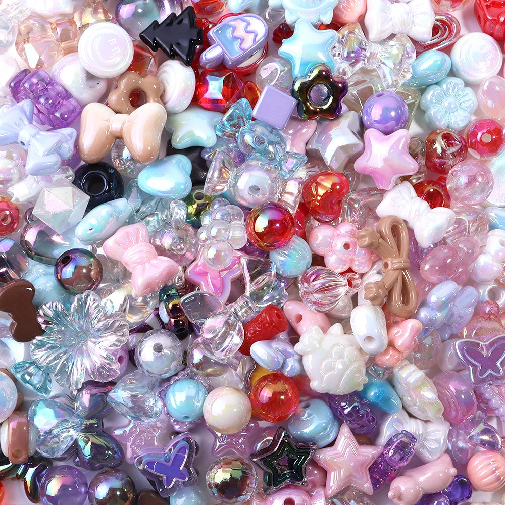 A close-up of colorful acrylic bow beads and various gemstone beads for DIY jewelry making