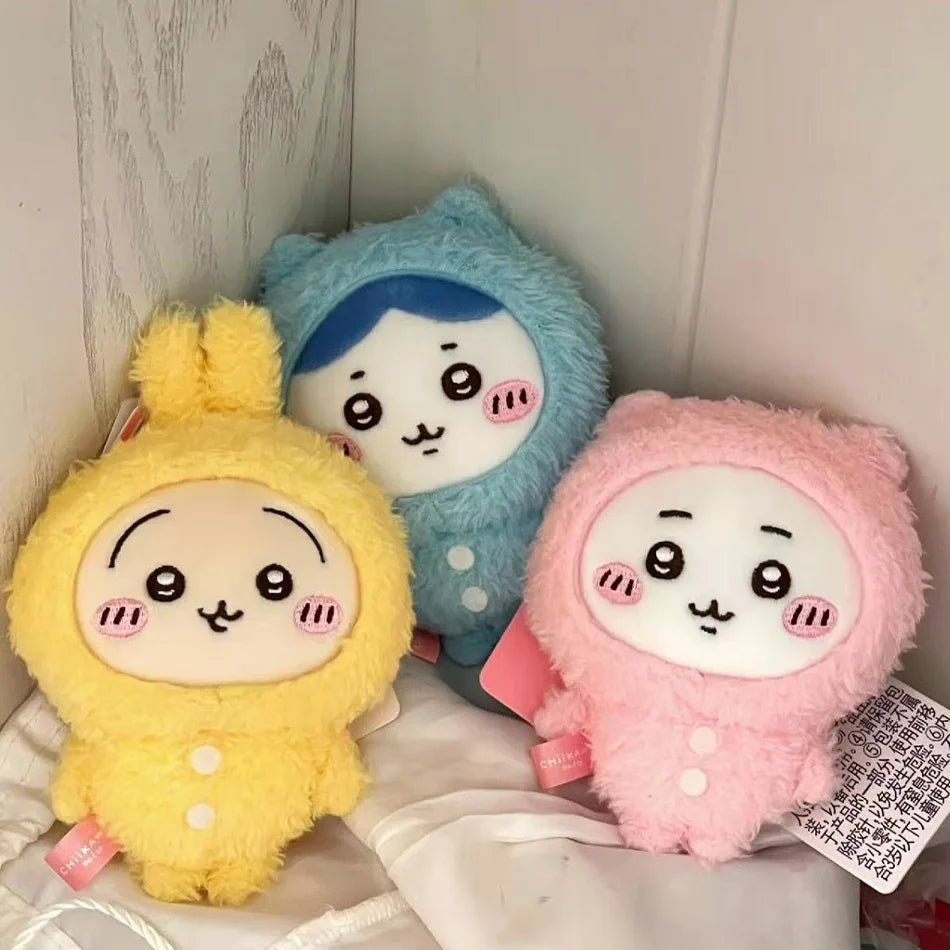 Three pastel-colored Usagi Hachiware plush keychains in a pajama theme, featuring blue, yellow, and pink characters.