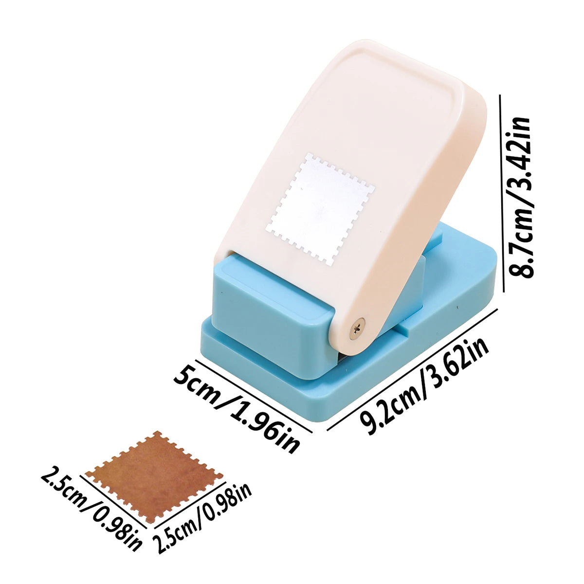 A beige lever action embosser tool with a white embossing plate and blue base for scrapbooking.