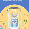 A clear device for UV disinfection and automatic air drying of a toothbrush is shown with a blue panda-like figure inside.