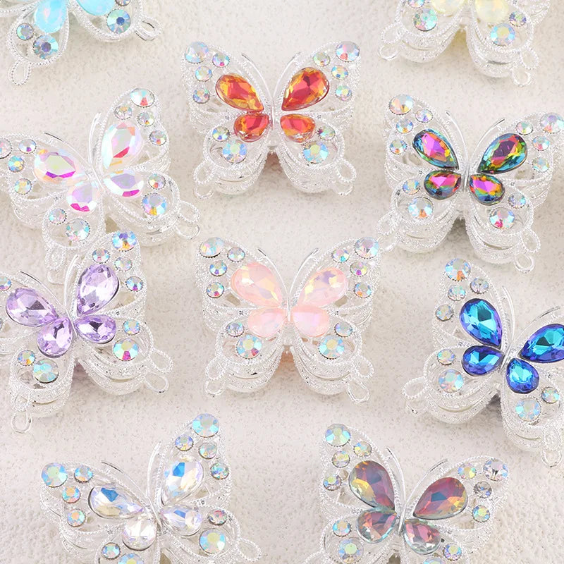 A collection of colorful crystal butterfly beads used for jewelry making.