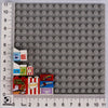 A set of mini supermarket and food building blocks featuring bricks like pizza, cake, and condiment items.
