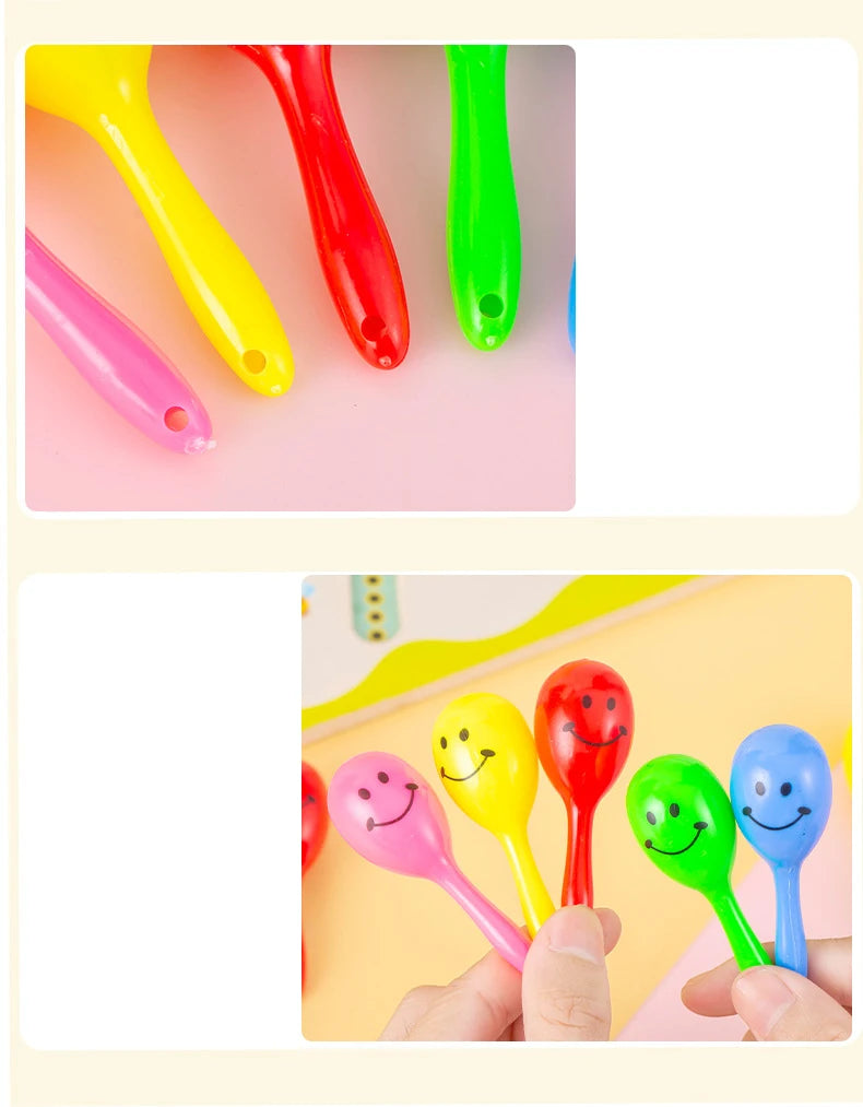 A collection of colorful mini maracas shaker toys in various bright colors like yellow, red, pink, and green.