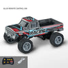 An alloy remote control off-road truck with a black and red racing design and a transmitter.
