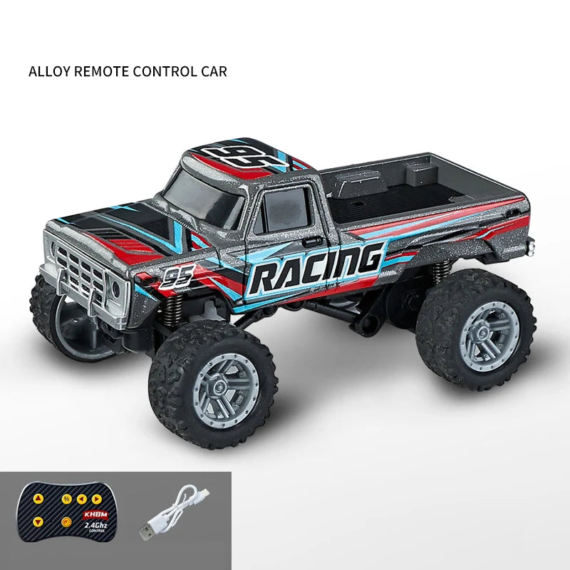 An alloy remote control off-road truck with a black and red racing design and a transmitter.