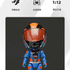 A miniature collectible of an Off-Road motorcycle helmet featuring blue and orange colors.