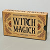 A rectangular cardboard box for a Witch Magick oracle deck featuring ornate text and botanical illustrations.