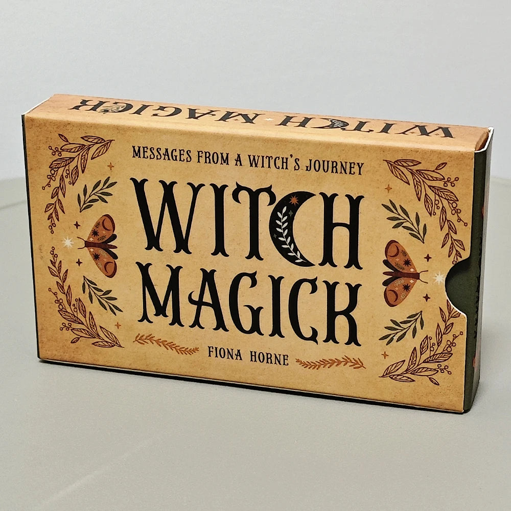 A rectangular cardboard box for a Witch Magick oracle deck featuring ornate text and botanical illustrations.
