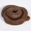 A realistic squishy prank toy shaped like soft fake poop, brown and textured.