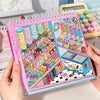A pink and purple sticker book filled with 3D kawaii miniature scenes featuring various candies and food items for scrapbooki