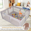 A large gray mesh baby playpen with a breathable design, shown in an indoor living room setting.